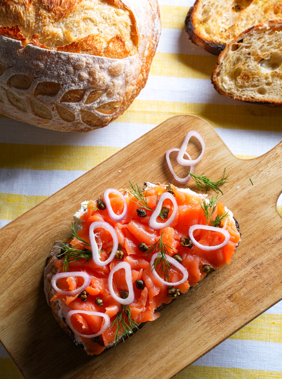 Smoked salmon toast with dill, shallot, and capers