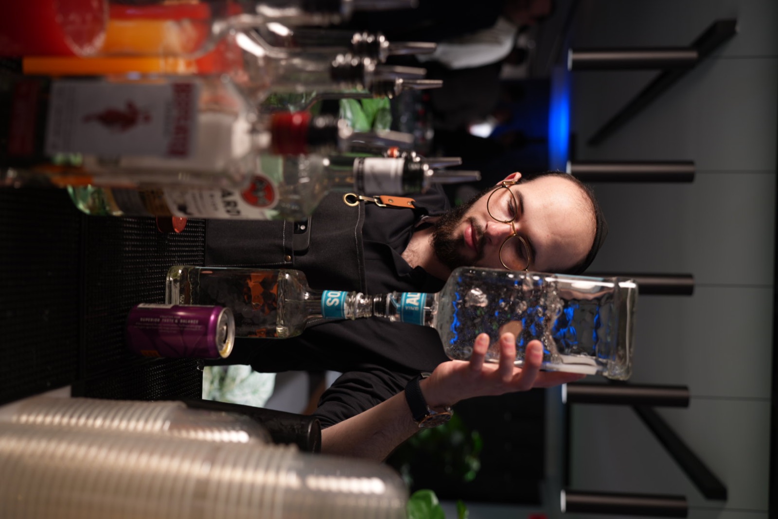 Chef Shayala building drinks behind a bar